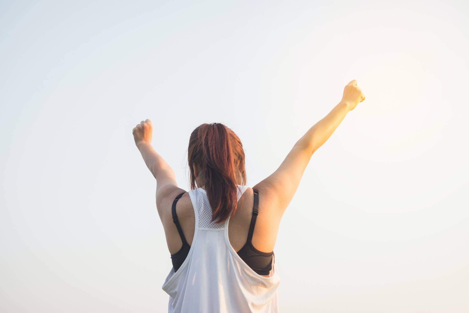 woman with hands up